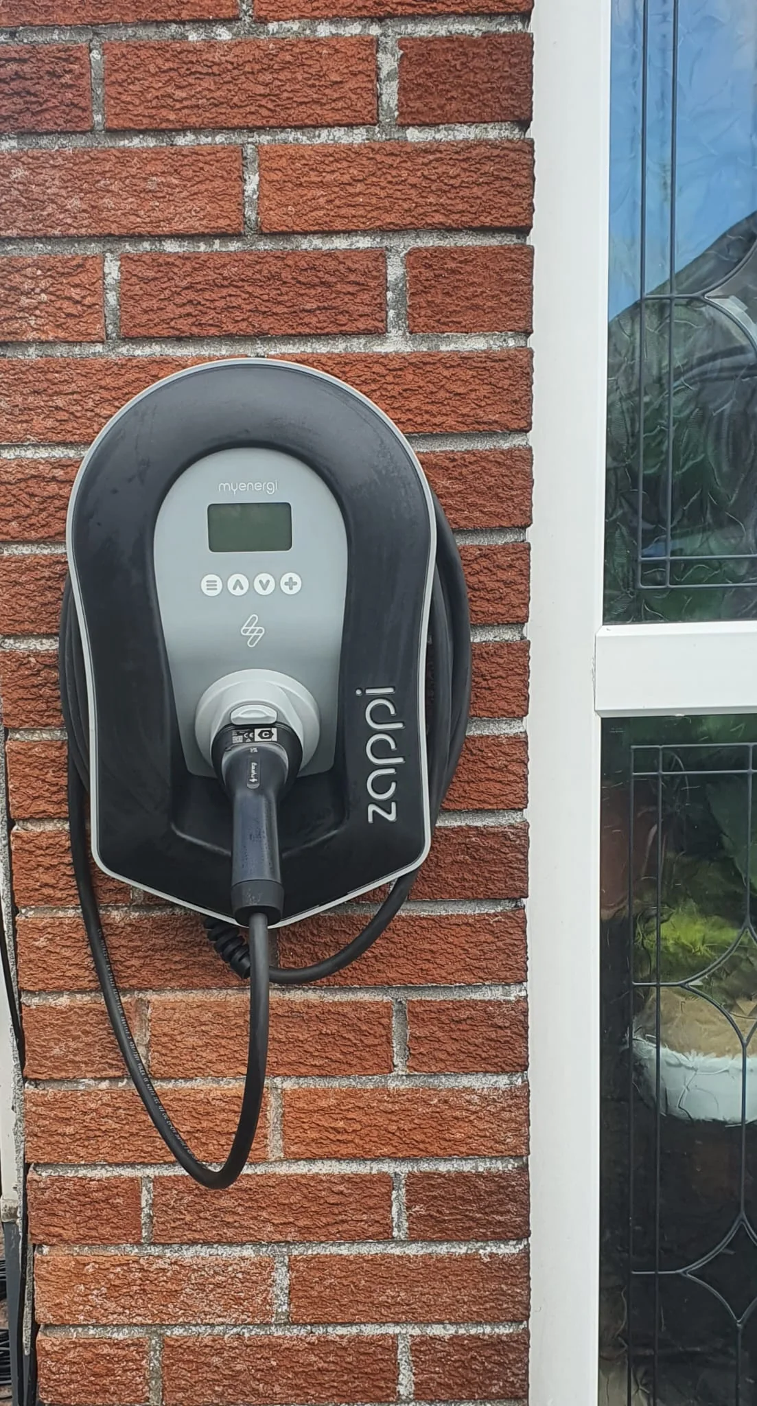 myenergi Zappi electric vehicle charger installed on a home
